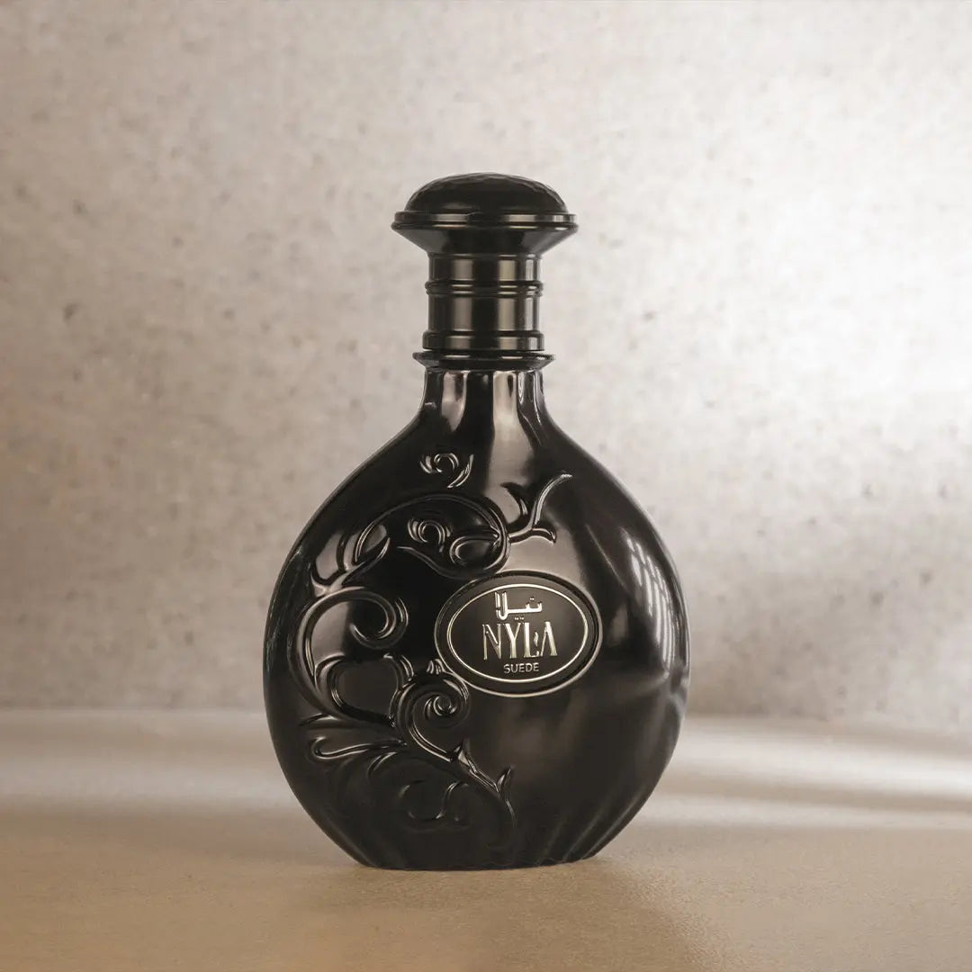 https://cdn.shopify.com/s/files/1/0798/6898/5693/files/Nyla-Suede-Perfume-80ml-EDP-Arabiyat-Prestige-175657375.jpg?v=1756220147