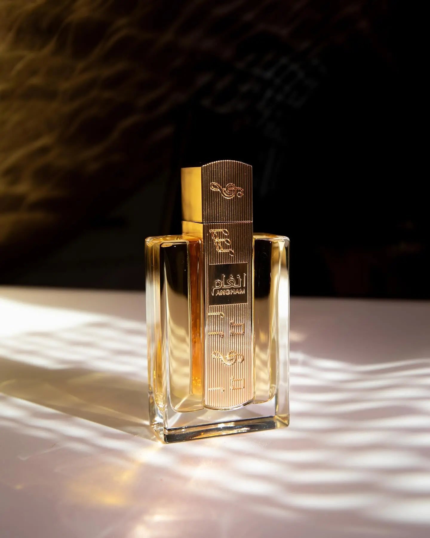 https://cdn.shopify.com/s/files/1/0798/6898/5693/files/Angham-Perfume-100ml-EDP-Lattafa-169954887.jpg?v=1750897184