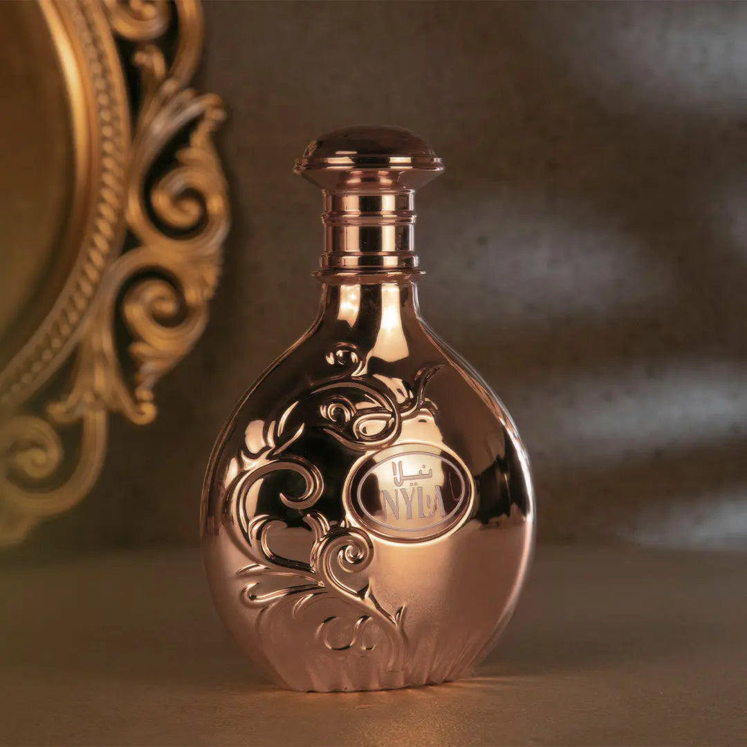 https://cdn.shopify.com/s/files/1/0798/6898/5693/files/Nyla-Perfume-80ml-EDP-Arabiyat-Prestige-175656542.jpg?v=1756219624