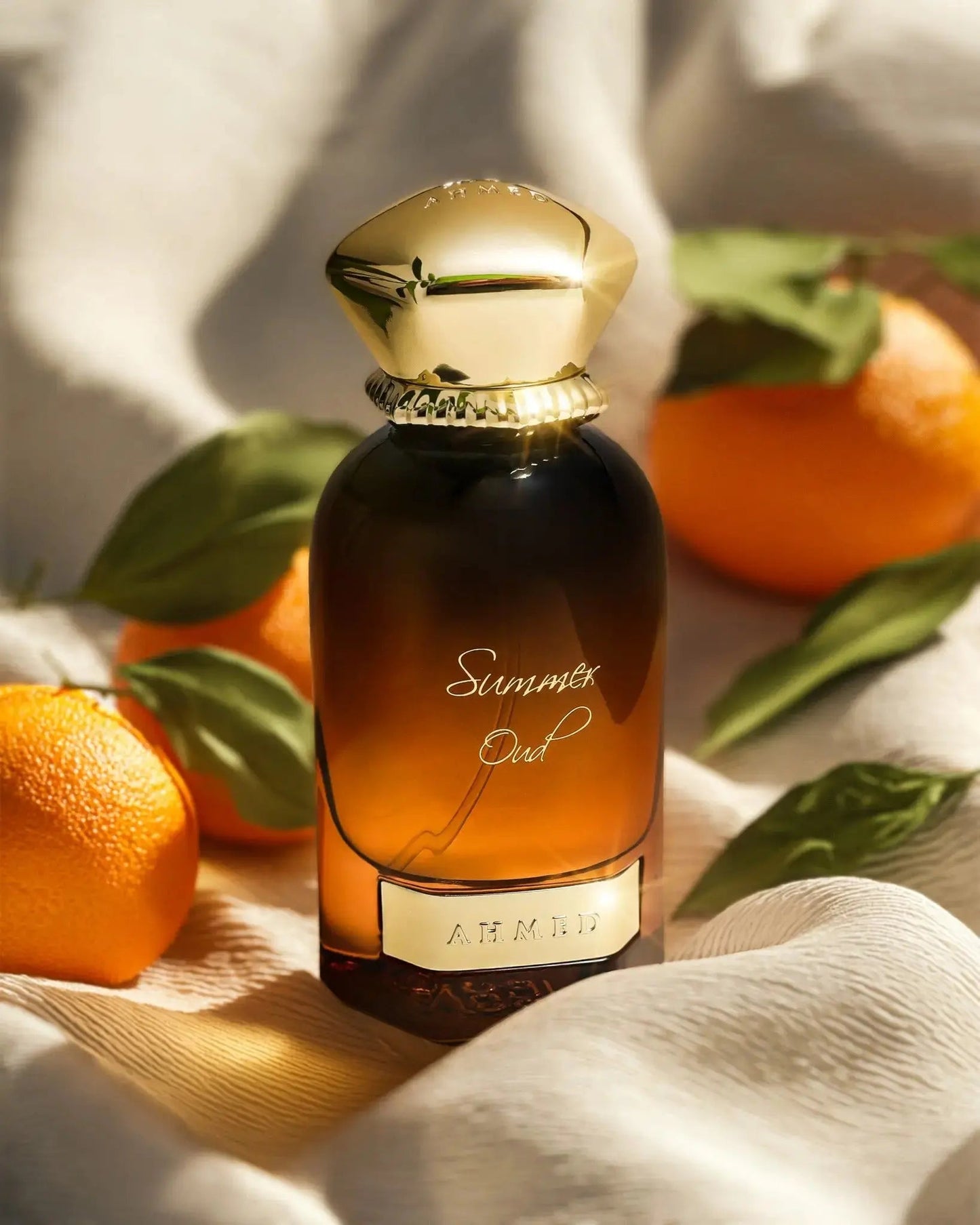 https://cdn.shopify.com/s/files/1/0798/6898/5693/files/Summer-Oud-Perfume-60ml-EDP-Ahmed-Al-Maghribi-178722596.jpg?v=1759840043