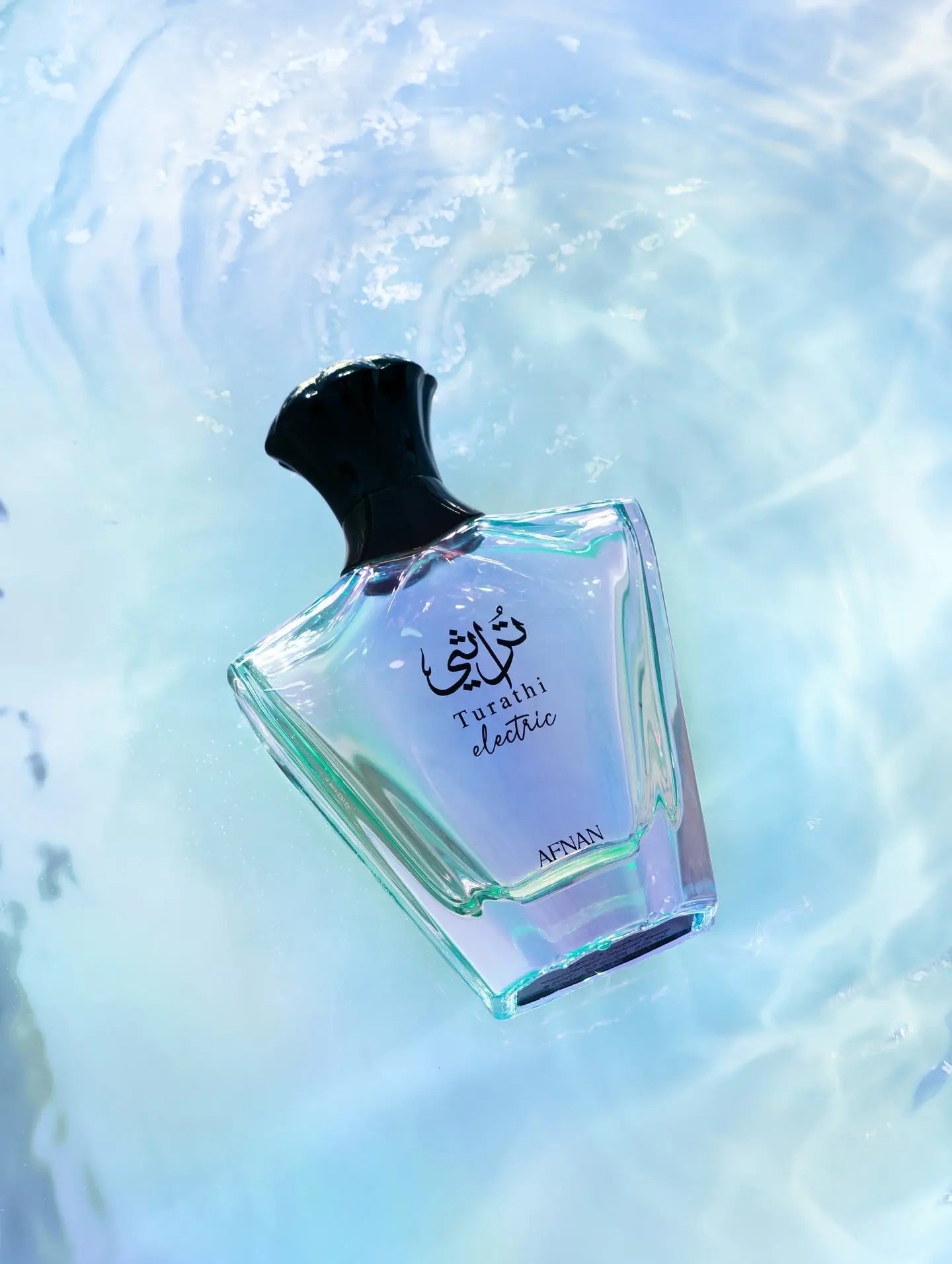 https://cdn.shopify.com/s/files/1/0798/6898/5693/files/Turathi-Electric-Perfume-90ml-EDP-Afnan-169994239.jpg?v=1750966779